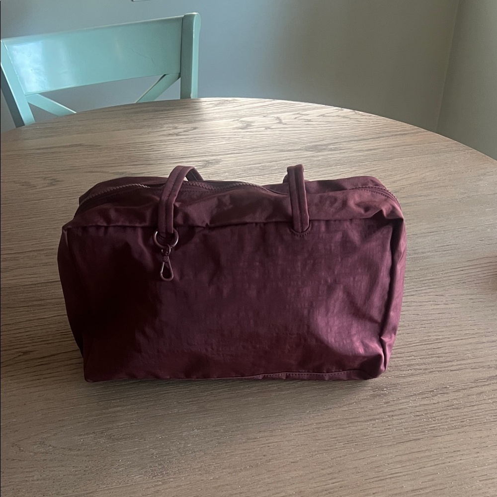 Baggu Bowler Bag. Excellent condition. Width 14”, Length 8”. Strap length 12”.